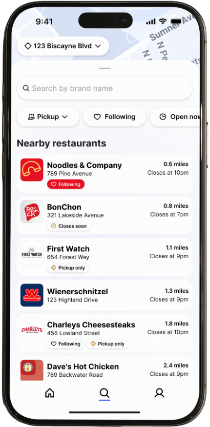 Smartphone screen showing a restaurant discovery app with nearby listings, distances, pickup options, ratings, and closing times in a clean interface.